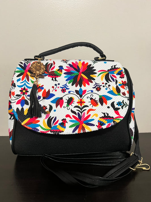 Black floral handbag